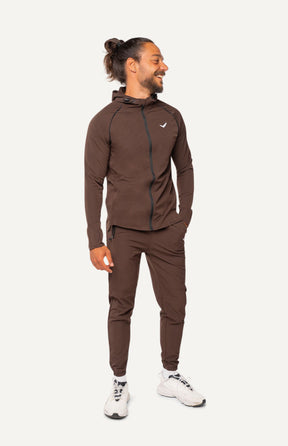 All-Day-Tracksuit für Männer, vielseitiger Trainingsanzug mit Daumenschlaufe, Zipp-Tasche und elastischem Bund, ideal für Outdoor-Aktivitäten und entspannten Komfort.